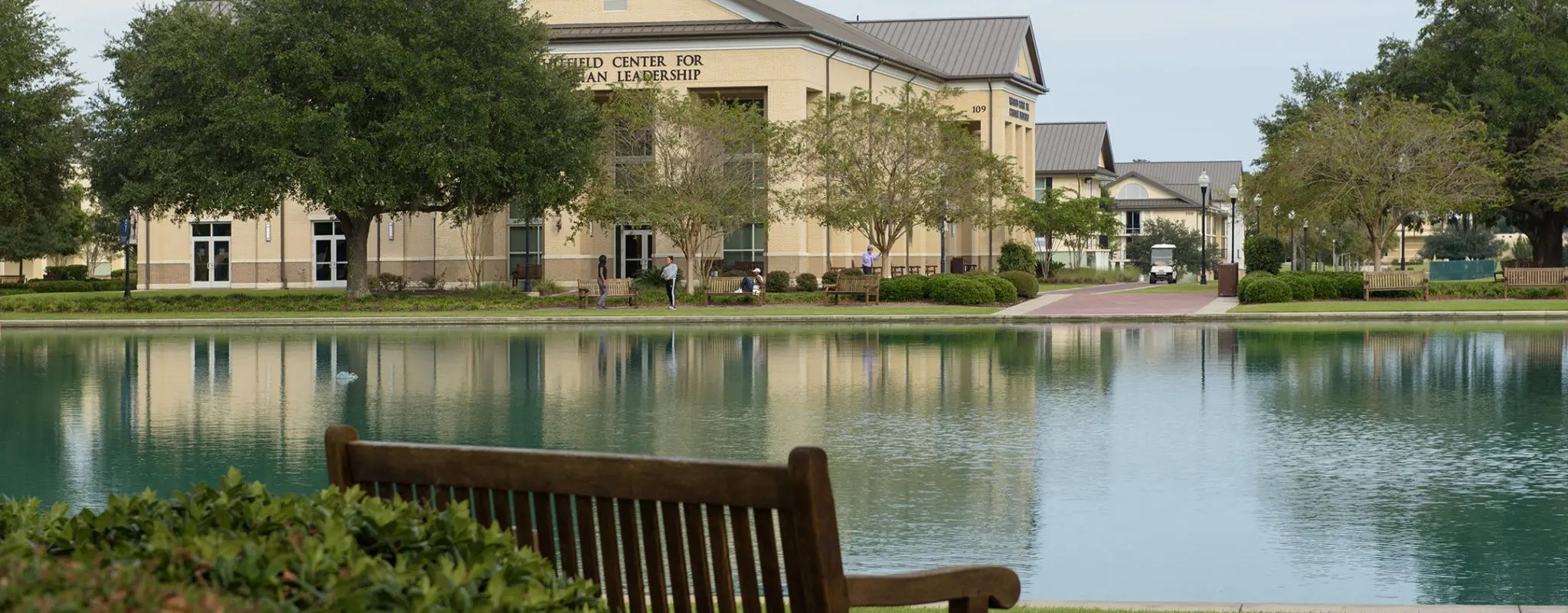 The Whitfield Center for Christian Leadership building as seen from the opposite side of the reflection pond on CSU's campus.