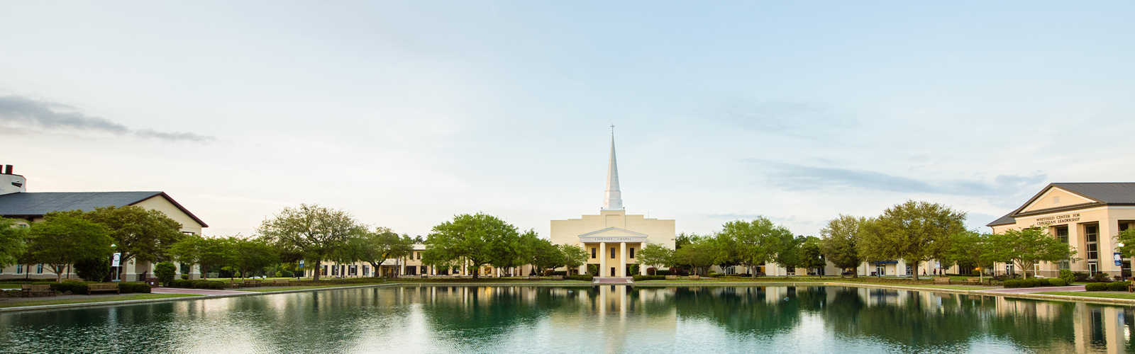 Landscape picture of the campus with the Chapel in the center.